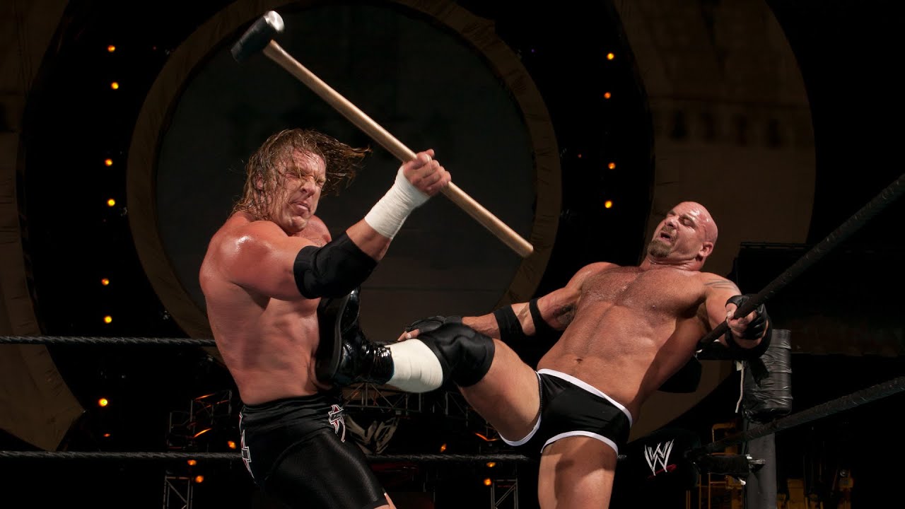 Triple H vs. Goldberg