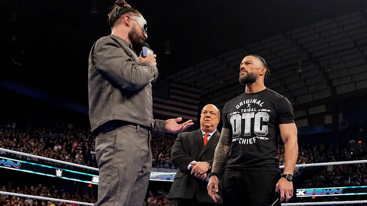 Seth Rollins, Paul Heyman & Roman Reigns