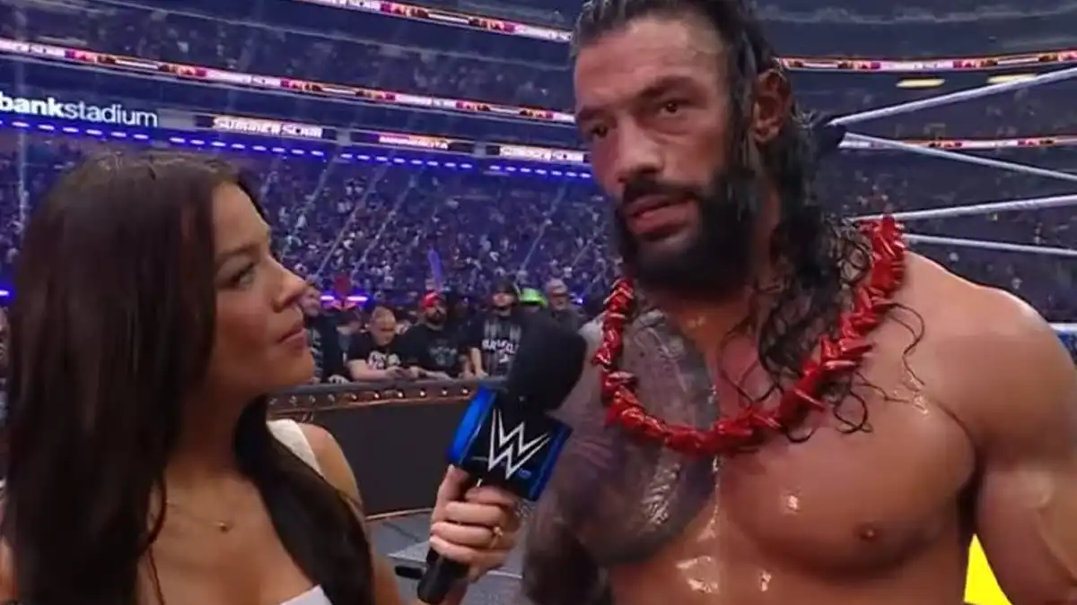 Jackie Redmond & Roman Reigns