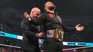 Triple H & Roman Reigns